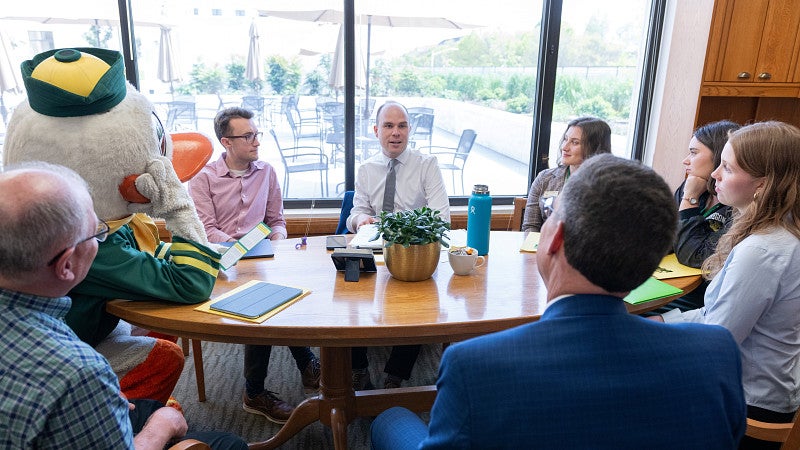 The Duck, President Karl Scholz, and several UO Advocates meet with Oregon House Majority Leader Ben Bowman in his office.