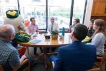 The Duck, President Karl Scholz, and several UO Advocates meet with Oregon House Majority Leader Ben Bowman in his office.